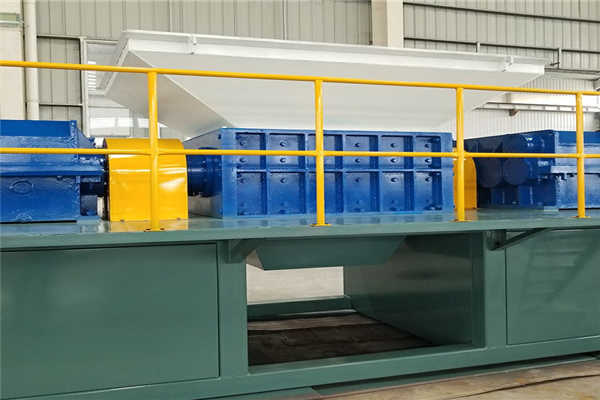 按工作原理可將雙軸撕碎機分為兩類